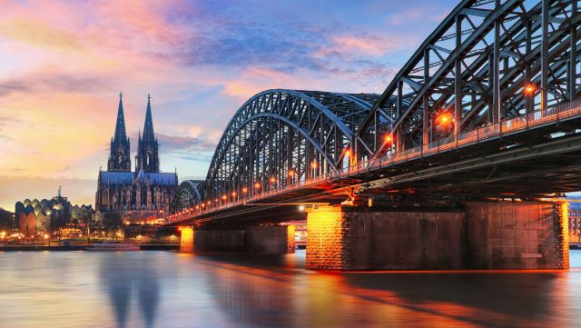 River underneath bridge in Cologne