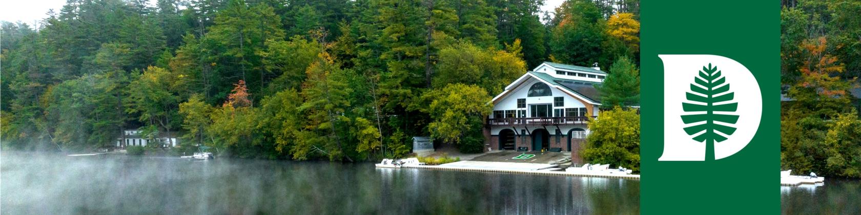 Boathouse on river in spring