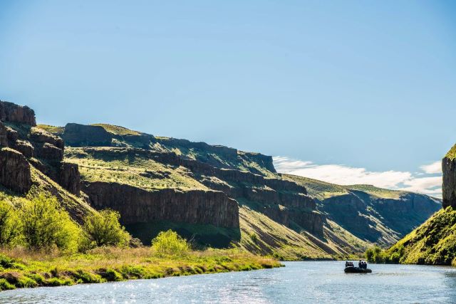 Boat sailing down the snake river